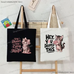 Cartoon Cat Women Canvas Tote Bag "Hey You Dropped This" Funny Brain Y2K Shopping Bags Humorous Animal Student Shoulder Handbag